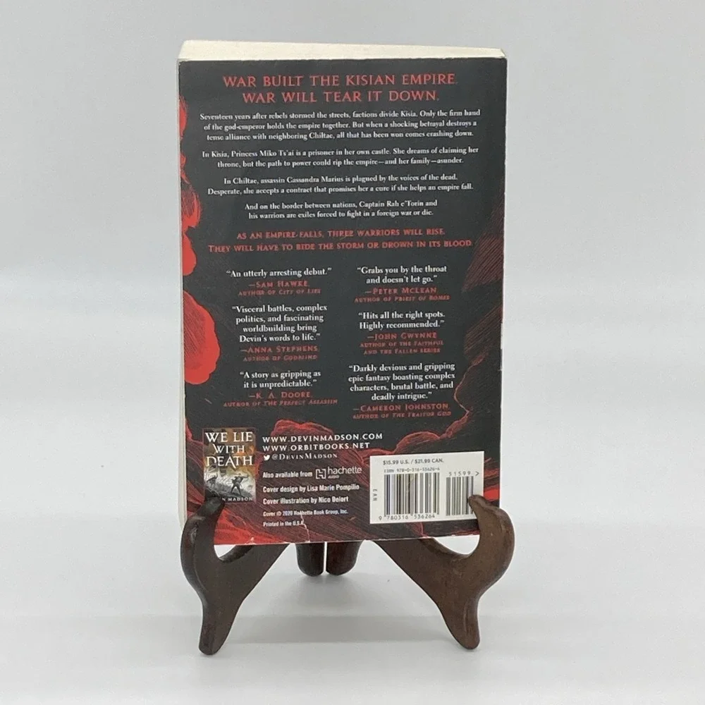 We Ride the Storm: The Reborn Empire #1 by Devin Madson paperback, Fantasy novel